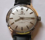 Lanco 70's watch with steel case and black leather strap