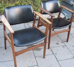 Danish 50's or 60's armchairs upholstered in black vinyl
