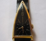 Orfina 60's ladie's watch, spectacular triangular form, black dial and goldplated steel case