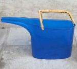 Fontana watering can by Stig Lindberg for Gustavsberg, plastic and rattan.