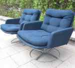 A pair of swivel easychairs, probably DUX